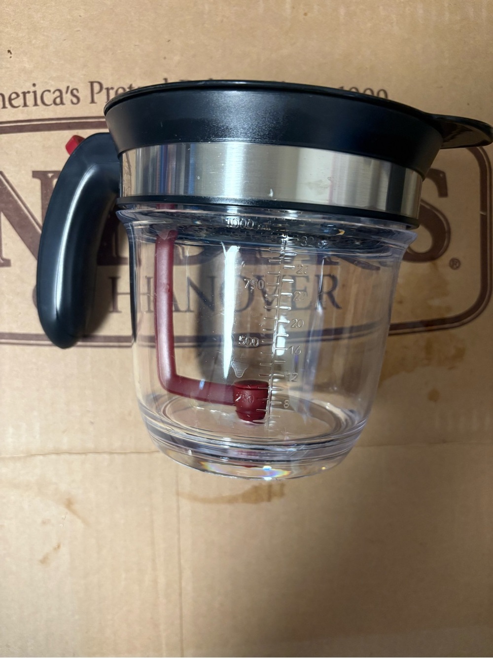 Black Plastic Strainer with Red Snap Lock Handle